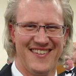 Regina names Iben school’s interim president