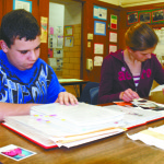 Students learn about life of bishops through letters, prayer cards
