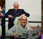 Bishop clips priest’s pony tail