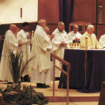 At Masses, Catholics pray for new pope