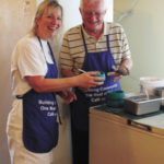 Bishop Amos serves the hungry at Café on Vine