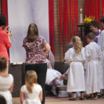 Second-graders learn about  service and the Eucharist