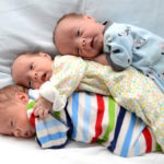Love multiplies for Catholic couple adopting triplets