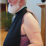Priest gets a ‘tattoo’ : Bold move helps make a point in Pentecost homily