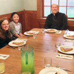 Video contest winners pray and eat with the bishop
