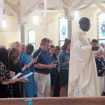 Catholics participate in month-long Marian devotion