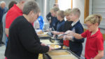 Students serve Thanksgiving meal to seniors