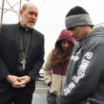 Bishop Zinkula accompanies refugee on ICE check-in