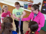A craft of prayer: Bettendorf students make rosaries before school