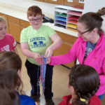 A craft of prayer: Bettendorf students make rosaries before school