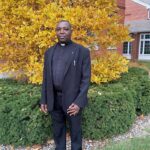 From Tanzania to St. Ambrose – Fr. Denis embraces academic and life experiences
