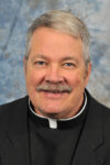 SAU professor Father Brian Miclot retires