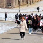 St. Ambrose University students stand with Ukraine