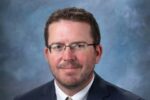 Archer continues as dean at SAU