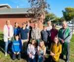 Students plant tree at St. Mary Parish in Wilton