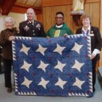 Parish presents priest with Quilt of Valor for military service