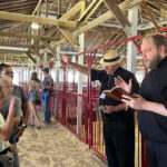 Bringing the joy of the Gospel to the county fair – Muscatine County parishes step out to welcome fairgoers