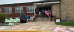 Notre Dame students chalk it up to welcoming, belonging