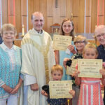 Knights recognize parishioners, first communicants