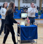 Cake auction brings Holy Trinity Catholic community together