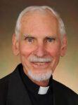 Priest served Albia parish