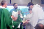 Eleven instituted as acolytes in Coralville